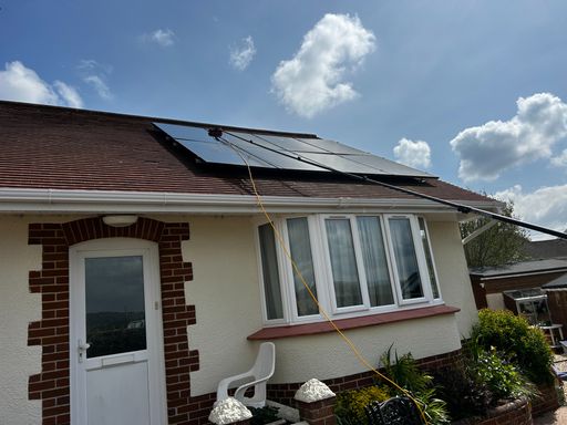 solar panels windows side of bungalow