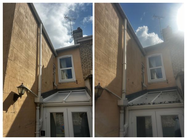 back of house with conservatory roof
