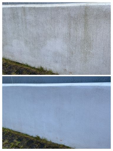 comparison of white garden wall before and after soft washing