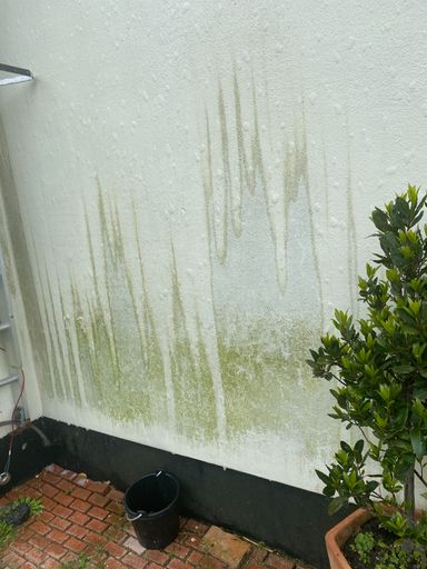 wall part way through cleaning