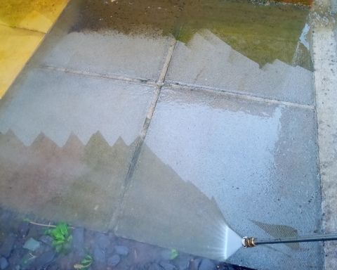 paving slabs being cleaned