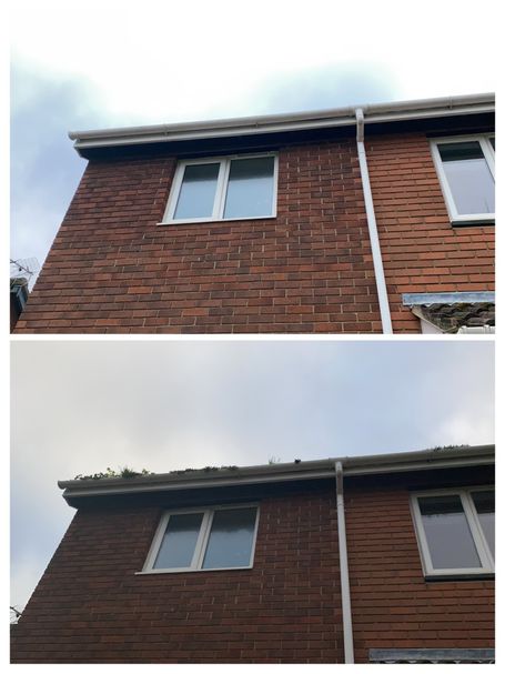 window, gutter and down pipe on front of house