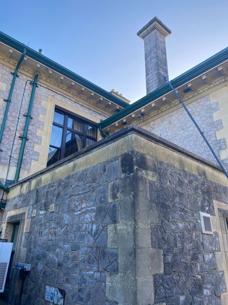 pole up to gutter on building