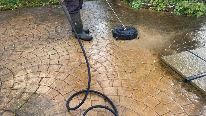feet, pipe and patio cleaner on patio