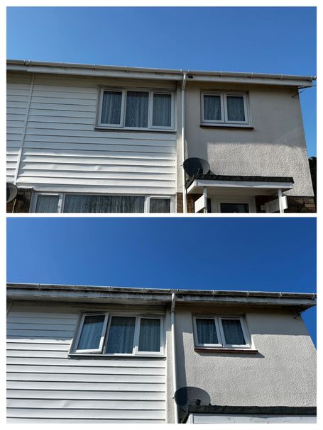 front of house with windows gutter blue sky
