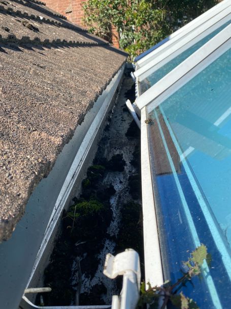 gutter between conservatory and roof