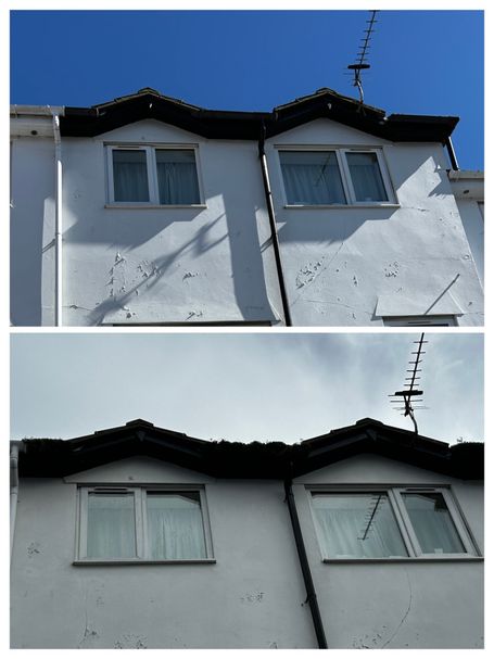 windows on side of house with guttering